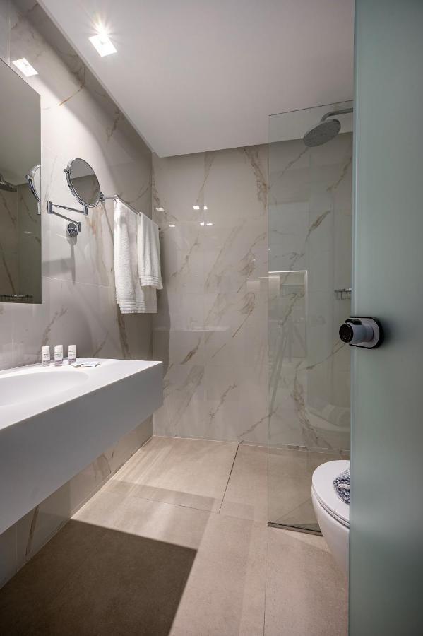 Mythos Suites Hotel Тігакі Екстер'єр фото